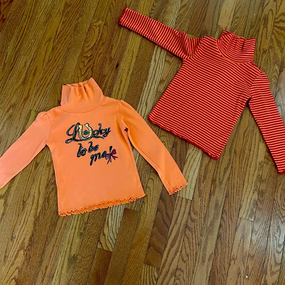 2 pc Palomino brand turtlenecks. Orange Lucky to be Me and orange stripe. 7/8